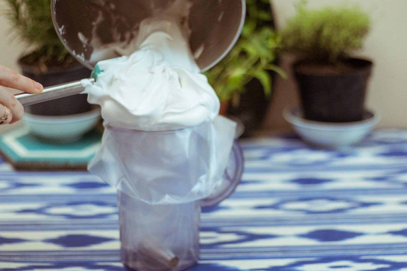 Scoop the marshmallow fluff into a decorating bag fitted with a round tip.