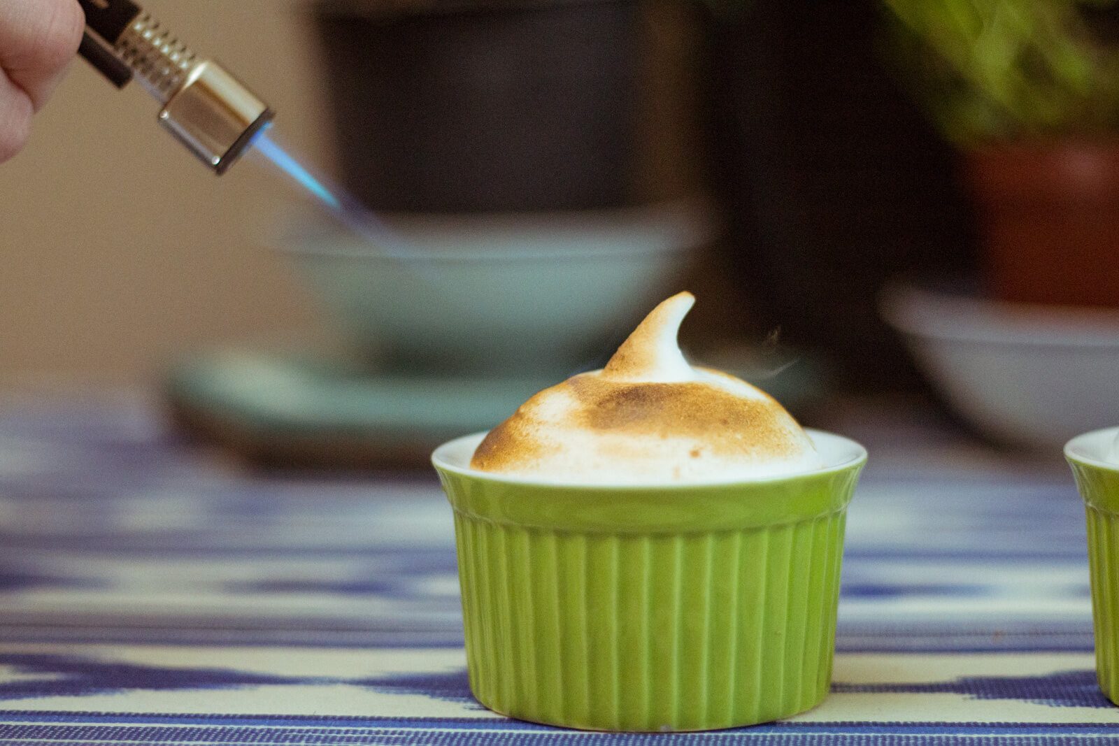 Brown marshmallows with a cooking torch.